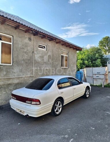 Nissan Maxima 1998, 320,646 km - 3.0 l - Qax