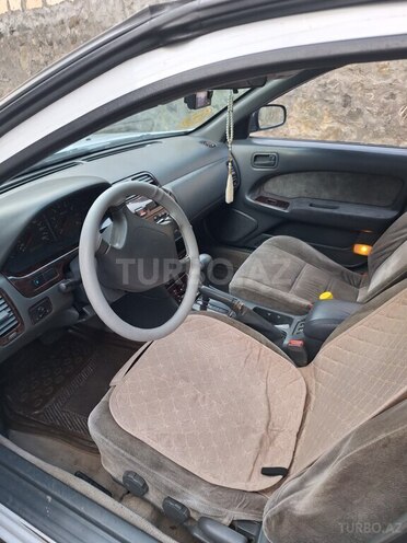 Nissan Maxima 1998, 320,646 km - 3.0 l - Qax