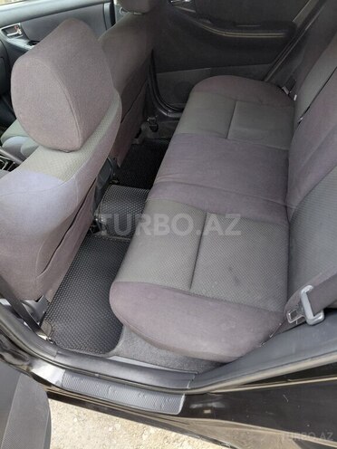 Toyota Corolla 2005, 308,000 km - 1.4 l - Qusar