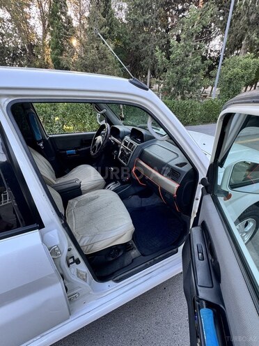 Mitsubishi Pajero io 1999, 335,000 km - 1.8 l - Bakı
