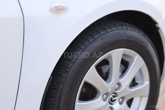 Mazda 2 2013, 265,000 km - 1.5 l - Qax