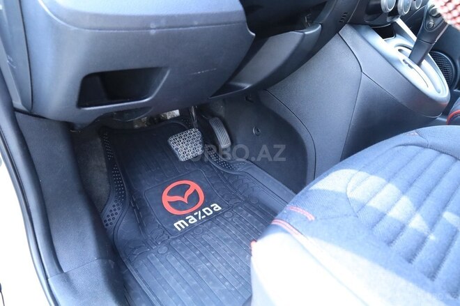 Mazda 2 2013, 265,000 km - 1.5 l - Qax