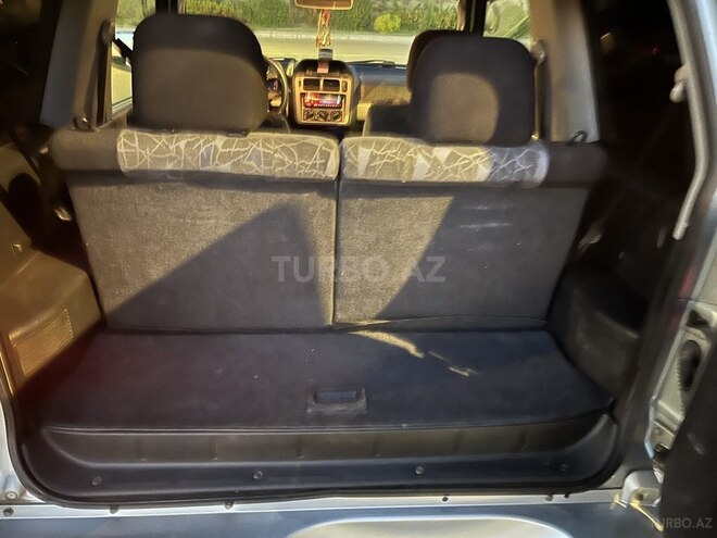 Mitsubishi Pajero io 1999, 300,000 km - 1.8 l - Bakı