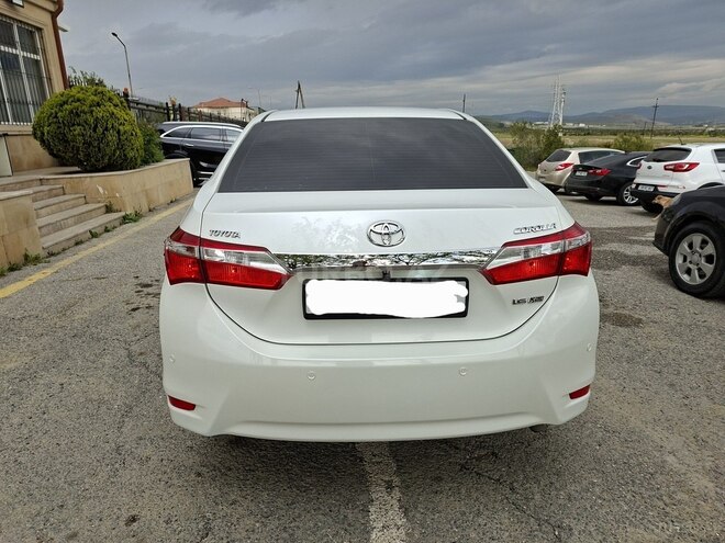 Toyota Corolla 2014, 180,000 km - 1.6 l - Bakı