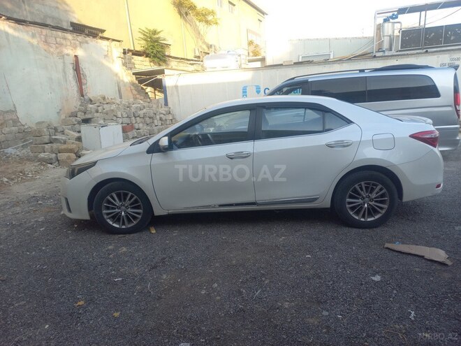 Toyota Corolla 2015, 175,000 km - 1.6 l - Bakı