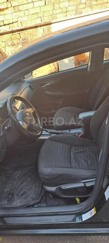 Toyota Corolla 2009, 287,000 km - 1.6 l - Bakı