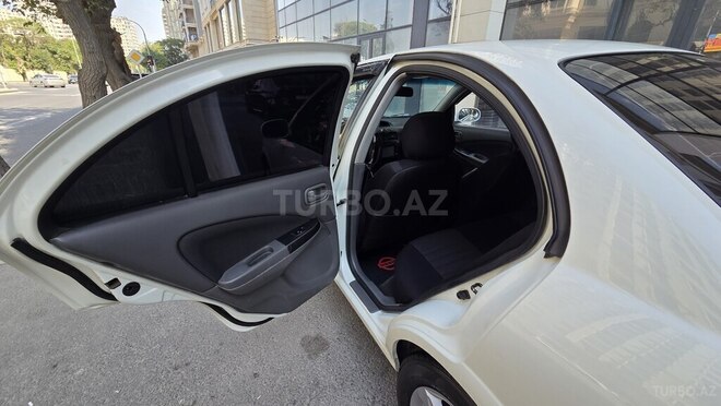 Nissan Sunny 2009, 198,000 km - 1.6 l - Bakı
