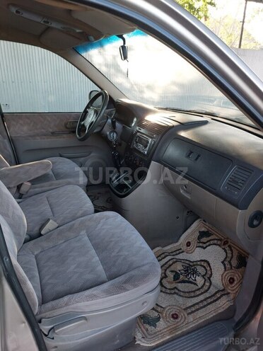 Kia Carnival 2003, 243,456 km - 2.5 l - Saatlı