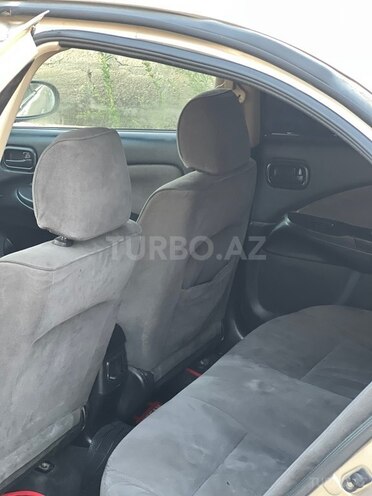 Nissan Sunny 2006, 390,000 km - 1.3 l - Bakı