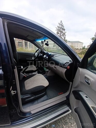 Mitsubishi L200 2011, 390,000 km - 2.5 л - Quba