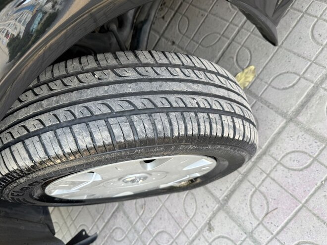 Nissan Sunny 2006, 299,000 km - 1.6 l - Bakı