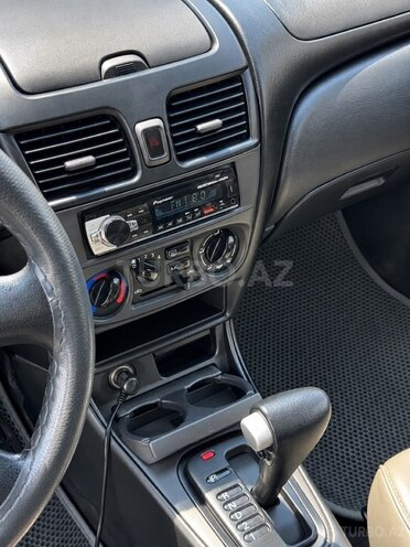 Nissan Sunny 2006, 328,000 km - 1.3 l - Bakı