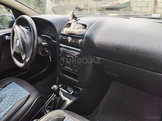 Opel Astra 1999, 475,131 km - 1.6 l - Qusar