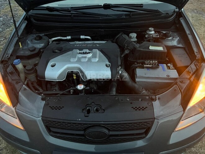 Kia Rio 2006, 363,286 km - 1.5 l - Qax