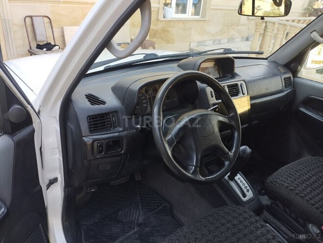 Mitsubishi Pajero io 2000, 300,000 km - 1.8 l - Bakı