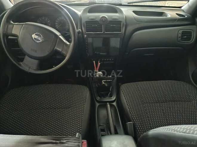 Nissan Sunny 2008, 418,000 km - 1.6 l - Qax