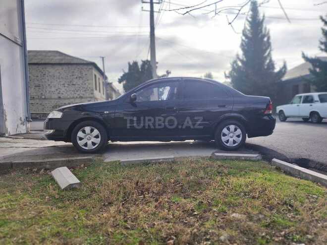 Nissan Sunny 2008, 418,000 km - 1.6 l - Qax