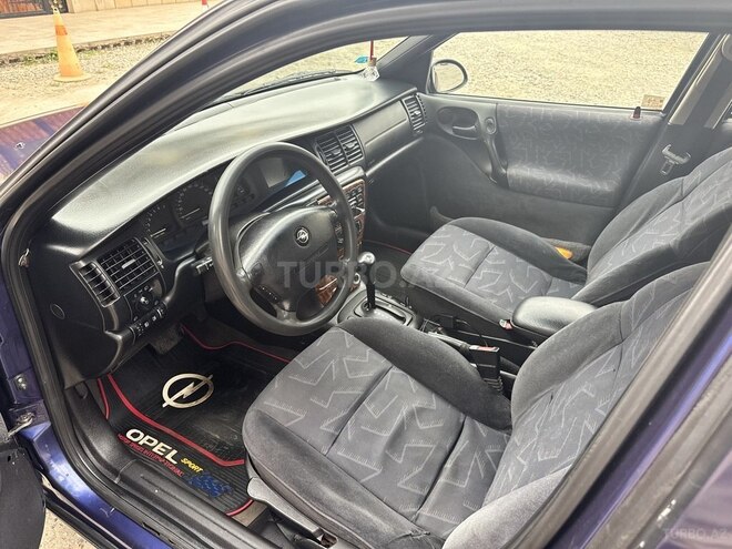 Opel Vectra 1996, 316,394 km - 1.8 l - Quba