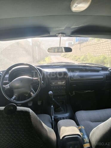GAZ 3110 1997, 303,000 km - 2.3 л - Bakı