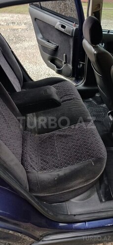 Opel Astra 1998, 401,313 km - 1.6 l - Quba