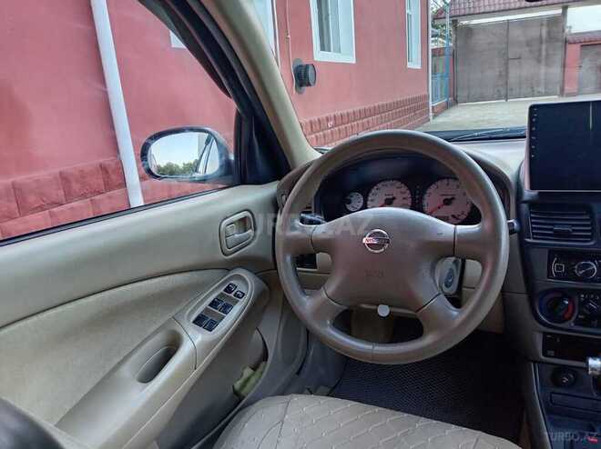 Nissan Sunny 2008, 250,000 km - 1.6 l - Qazax