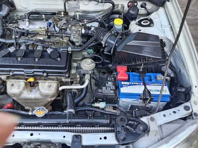 Nissan Sunny 2008, 250,000 km - 1.6 l - Qazax