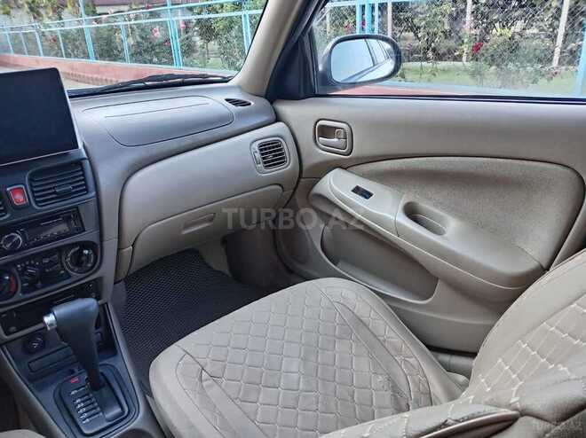 Nissan Sunny 2008, 250,000 km - 1.6 l - Qazax