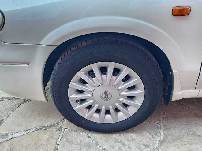 Nissan Sunny 2008, 250,000 km - 1.6 l - Qazax
