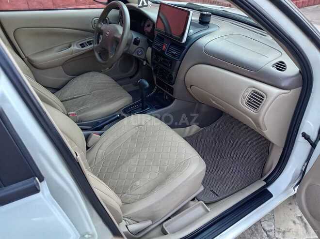 Nissan Sunny 2008, 250,000 km - 1.6 l - Qazax