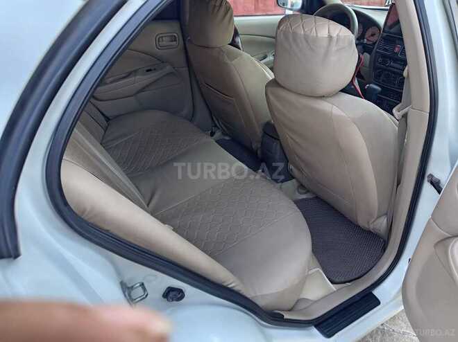 Nissan Sunny 2008, 250,000 km - 1.6 l - Qazax