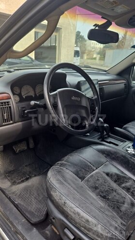 Jeep Grand Cherokee 2002, 32,000 km - 4.7 l - Qusar