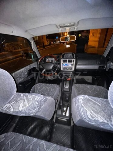 Mitsubishi Pajero io 1999, 351,000 km - 1.8 л - Bakı