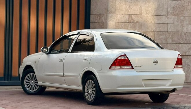 Nissan Sunny 2011, 220,000 km - 1.6 l - Bakı