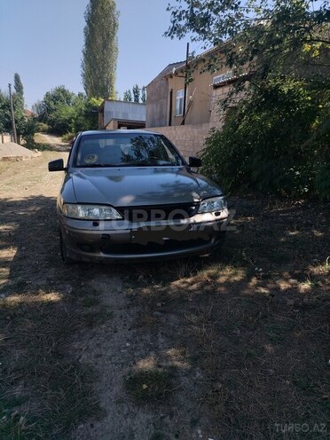 Opel Vectra 1998, 250,000 km - 1.6 l - Qusar