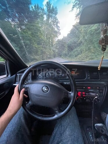 Opel Vectra 1998, 250,000 km - 1.6 l - Qusar