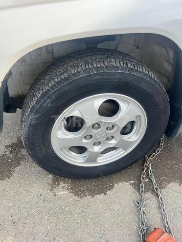 Mitsubishi Pajero io 1999, 300,000 km - 1.8 l - Bakı