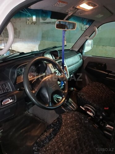 Mitsubishi Pajero io 1999, 300,000 km - 1.8 l - Bakı