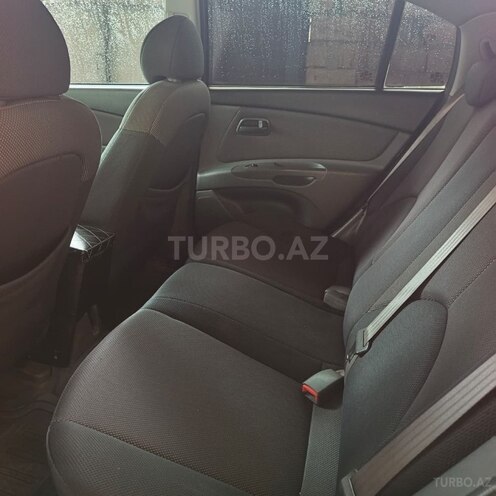 Kia Rio 2005, 300,000 km - 1.5 л - Yevlax