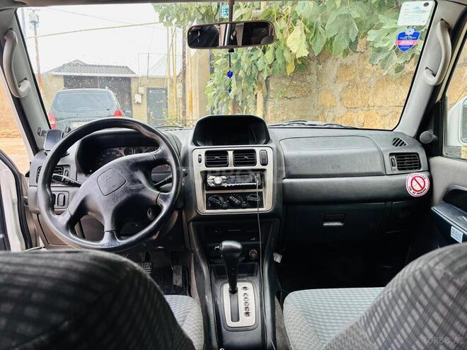 Mitsubishi Pajero io 1999, 254,000 km - 1.8 л - Bakı
