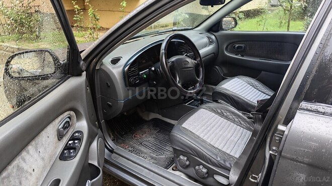 Kia  2002, 410,383 km - 1.8 л - Bakı