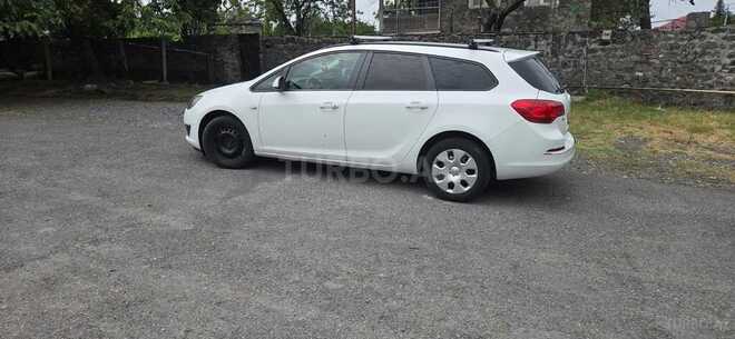 Opel Astra 2014, 380,000 km - 1.3 l - Qax