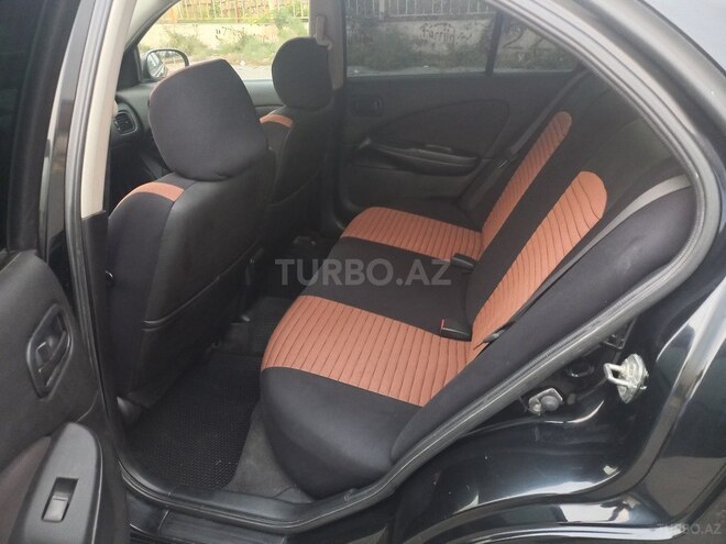 Nissan Sunny 2009, 124,597 km - 1.6 l - Bakı