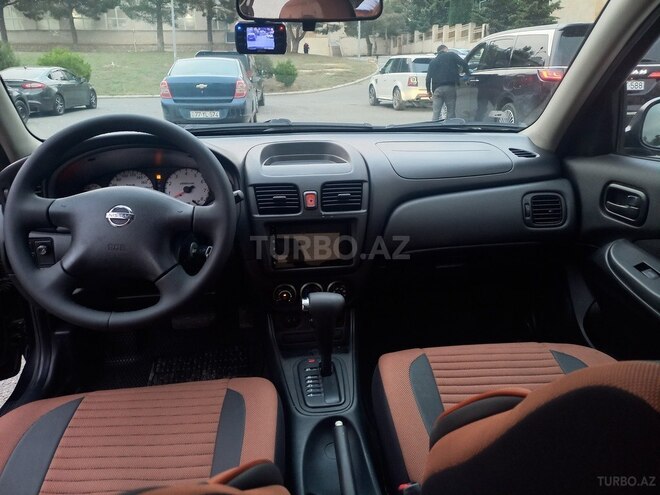 Nissan Sunny 2009, 124,597 km - 1.6 l - Bakı