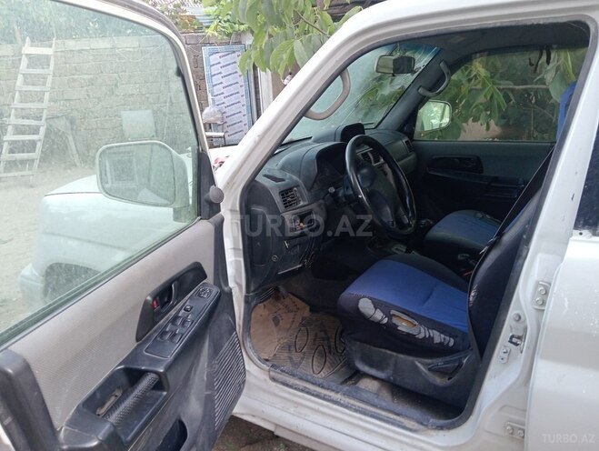 Mitsubishi Pajero io 1999, 201,530 km - 1.8 л - Bakı