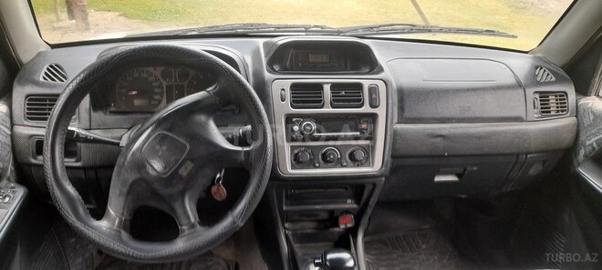 Mitsubishi Pajero io 1999, 505,423 km - 1.8 л - Yevlax