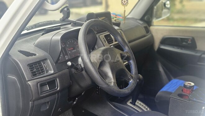Mitsubishi Pajero io 2001, 280,000 km - 2.0 l - Bakı
