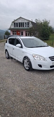 Kia  2010, 242,000 km - 1.4 l - Quba