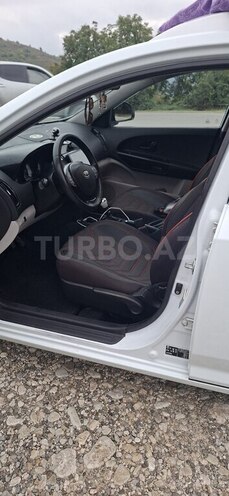 Kia  2010, 242,000 km - 1.4 l - Quba