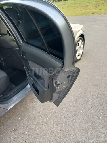 Opel Astra 2006, 230,000 km - 1.4 l - Qax