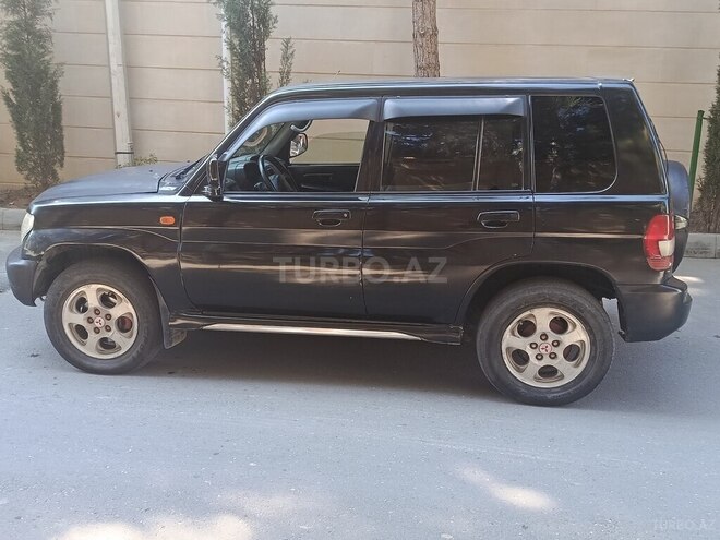 Mitsubishi Pajero io 2003, 330,000 km - 2.0 l - Bakı